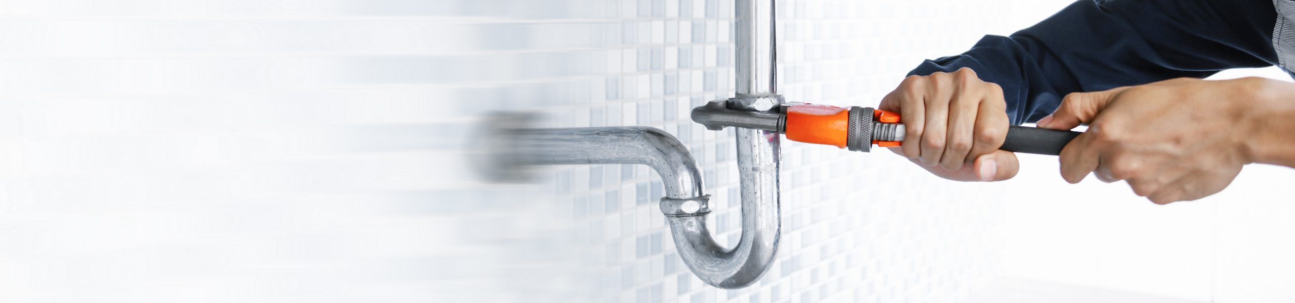 Plumber fixing pipe John G. Plumbing Drain and Sewer Cleaning