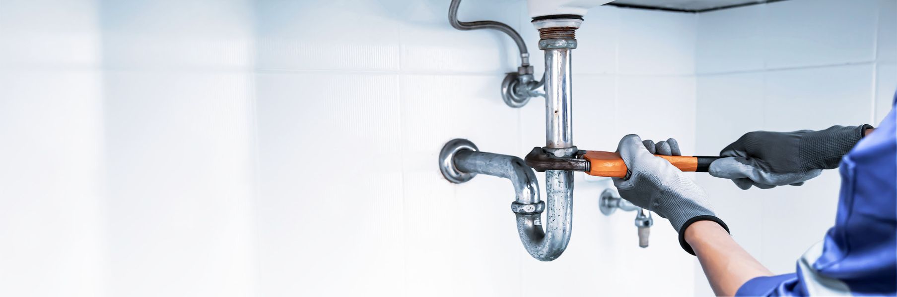 John G. Plumbing plumber fixing sink